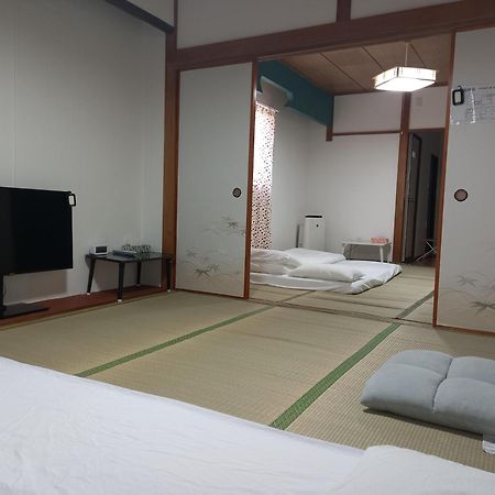 Lucky House Guest House Osaka Esterno foto
